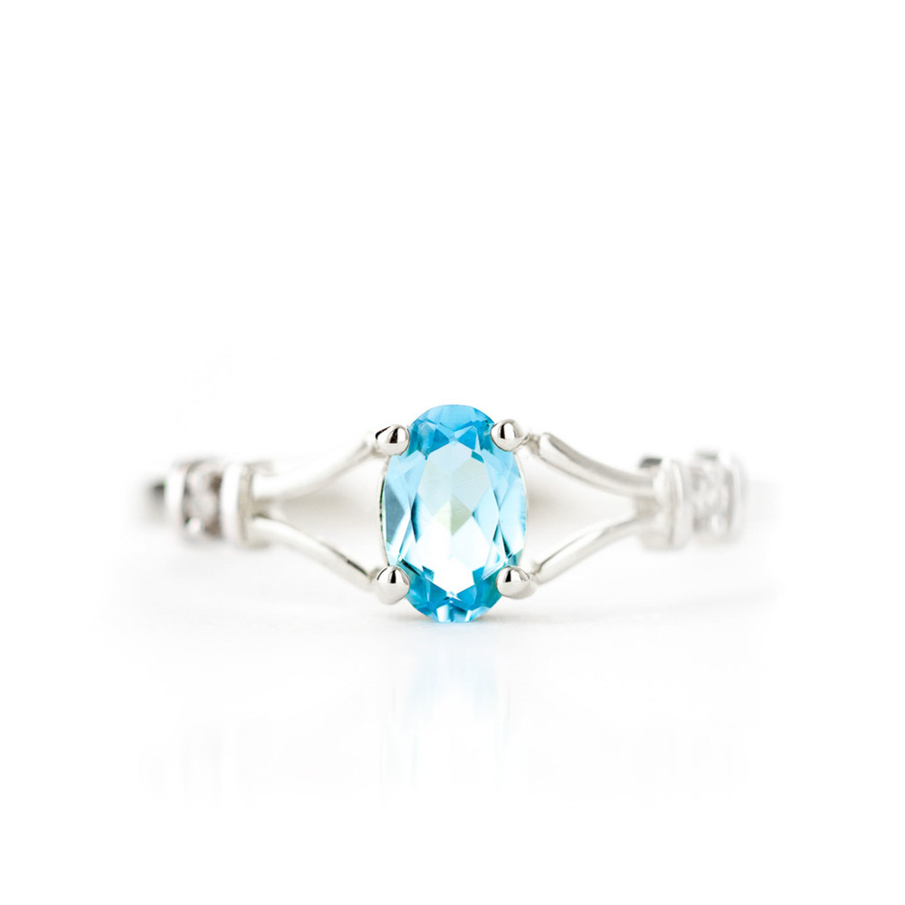 14K. SOLID GOLD RING WITH DIAMONDS & BLUE TOPAZ (White Gold)